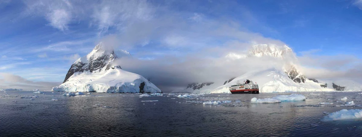 Hurtigruten-Fram-Lemaire-Channel-Antarctica - The Hurigruten flagship Fram disappears into the mists of the dramatic Lemaire Channel on its voyage to Antarctica.