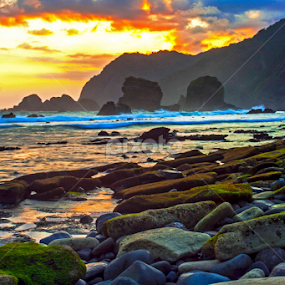 Sunset over Papuma Beach by Rudy Pras - Landscapes Sunsets & Sunrises
