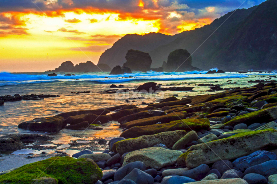 Sunset over Papuma Beach by Rudy Pras - Landscapes Sunsets & Sunrises