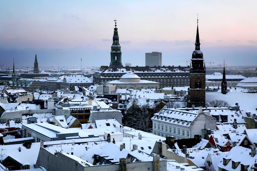 rooftops-of-Copenhagen-in-winter - Snow-covered rooftops of Copenhagen in winter.