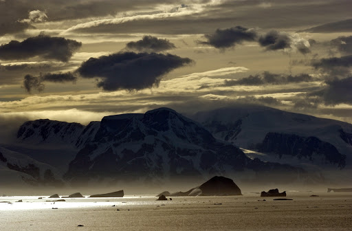 265d3LemaireStrait - Sunset at the Lemaire Strait. During the Antarctic summer, it never gets totally dark.