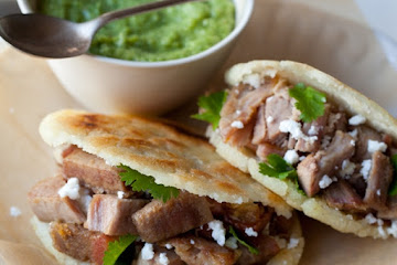 Arepas Filled with Carnitas and Guasacaca