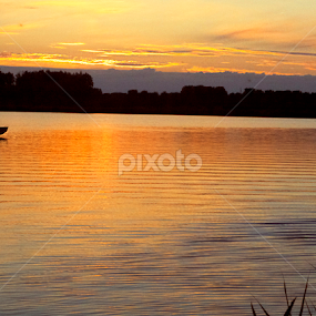 He and his boat by Joop Korrel - Landscapes Waterscapes