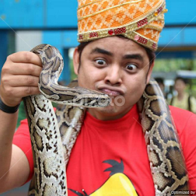 The Snakeman  by Kushal Ghosh - People Portraits of Men