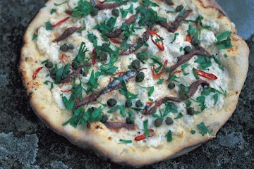 Mozzarella, anchovies, chilli, capers and parsley pizza topping