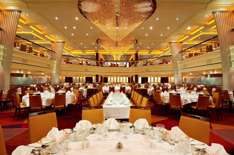 Enjoy dinners in the lavish Blush Dining Room during your cruise on Carnival Breeze.