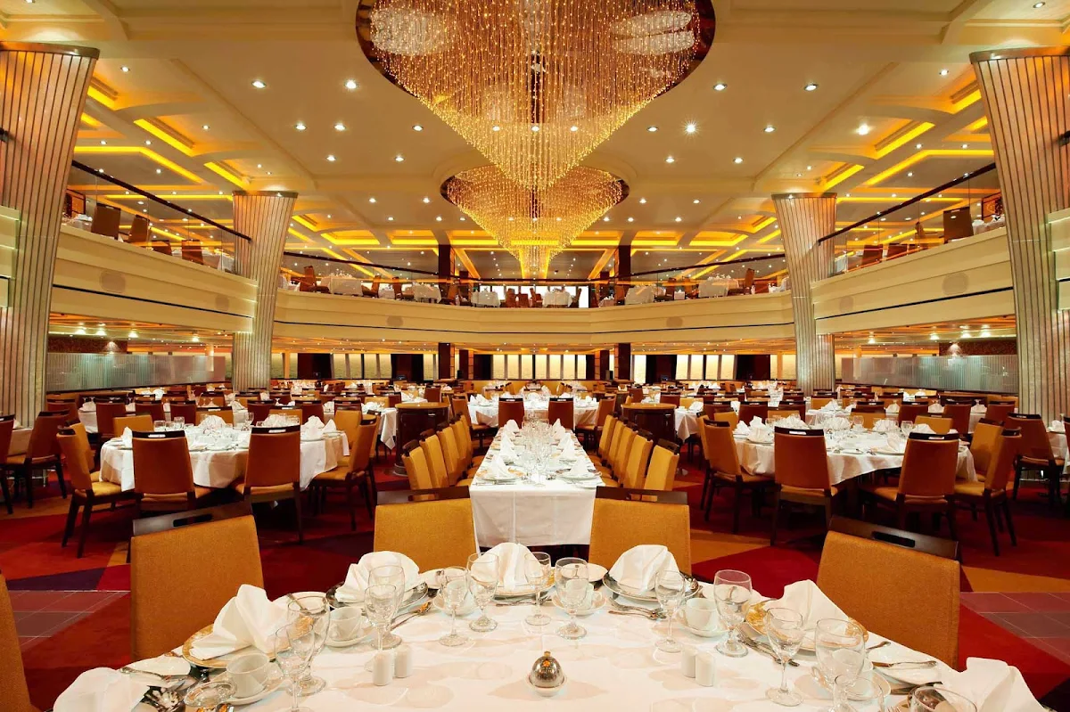 Carnival-Breeze-Blush-Dining-Room - Enjoy dinners in the lavish Blush Dining Room during your cruise on Carnival Breeze.