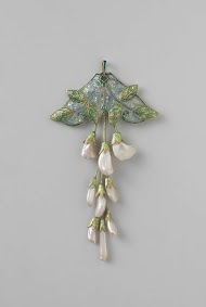 Hanger in de vorm van een tak blauwe regen