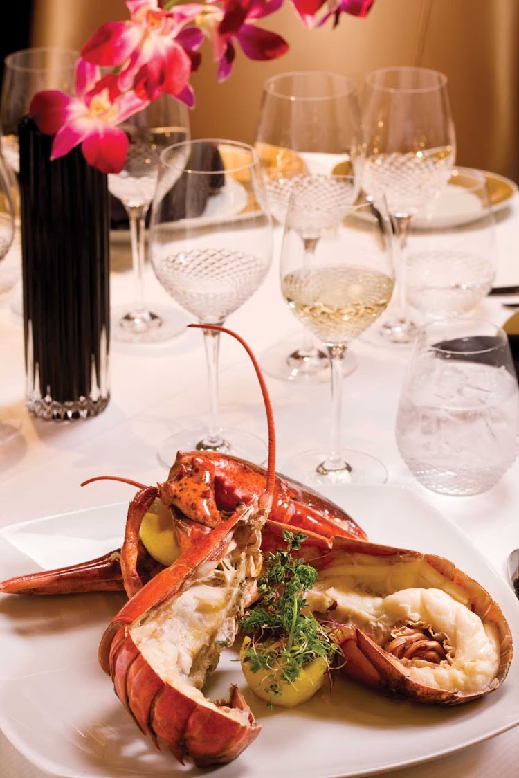 Treat yourself to Prime 7's whole Maine Lobster drizzled with warm butter and lemon during your cruise aboard Seven Seas Voyager.
