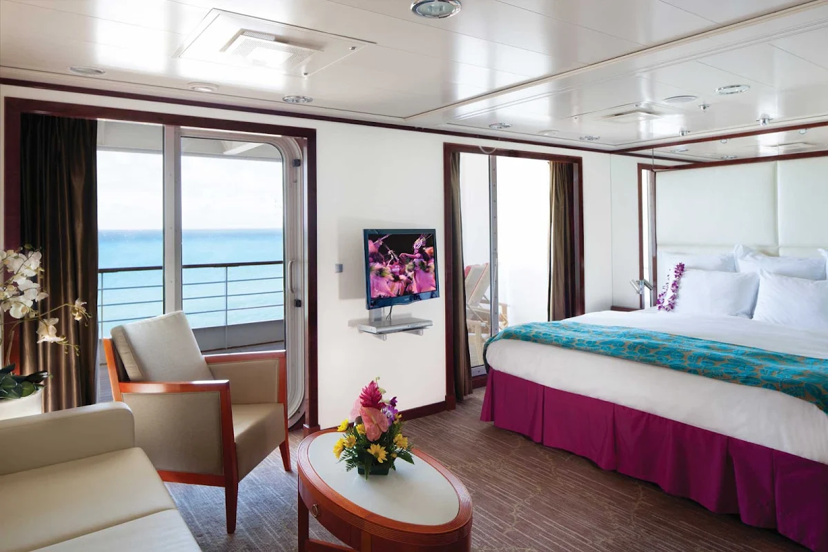 Norwegian-Pride-Of-America-Stateroom-Penthouse-SG-12510 - Enjoy the view from from your private balcony while staying at  Pride of America's Penthouse with Large Balcony.