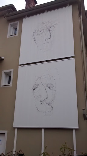 Two Faces on a Wall