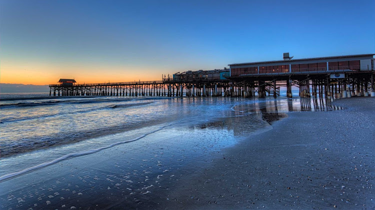 Cocoa Beach Pier at dawn.