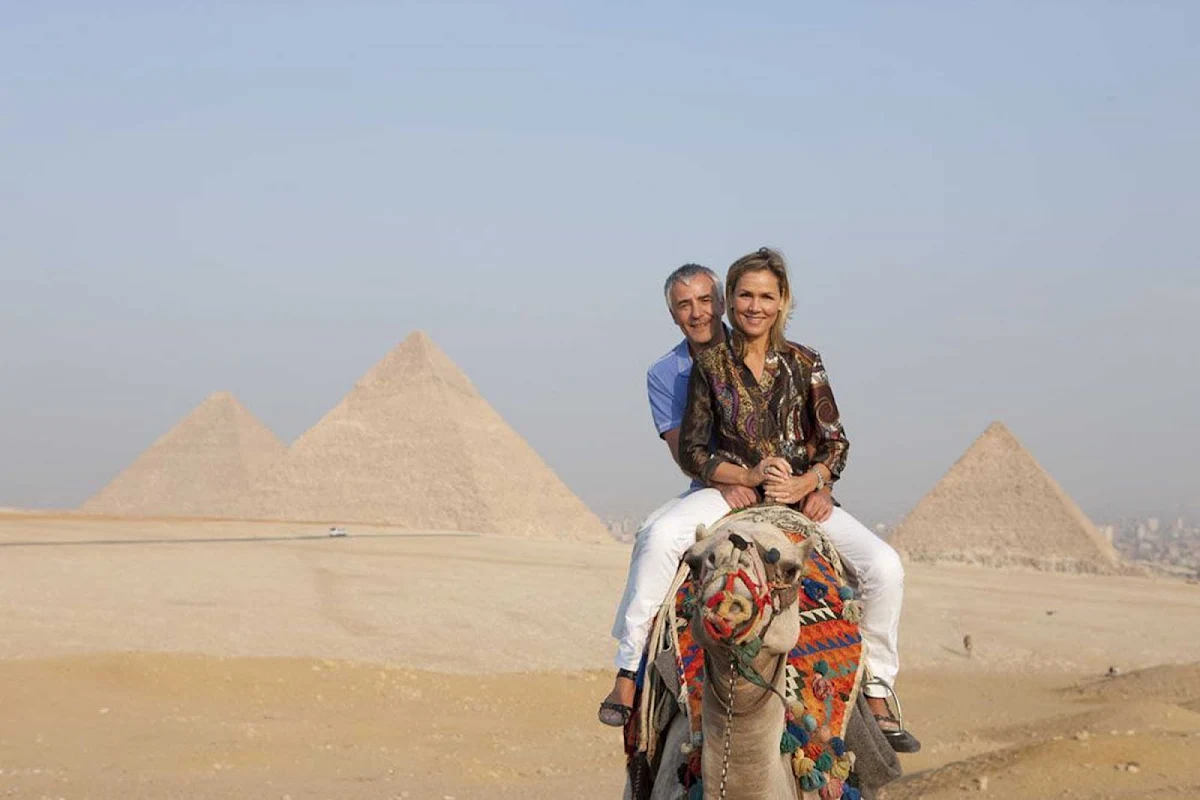 Uniworld-River-Cruises-Pyramids-of-Giza - Bucket list alert! Travel aboard Uniworld's River Tosca and explore the pyramids of Giza with a camel trek across the rolling sand dunes.