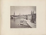 Gezicht op de haven en omliggende gebouwen van Zürich