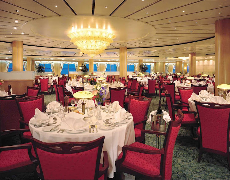 Enjoy a fine dining experience and the beautiful views at Norwegian Sky's Palace dining room on deck 5.